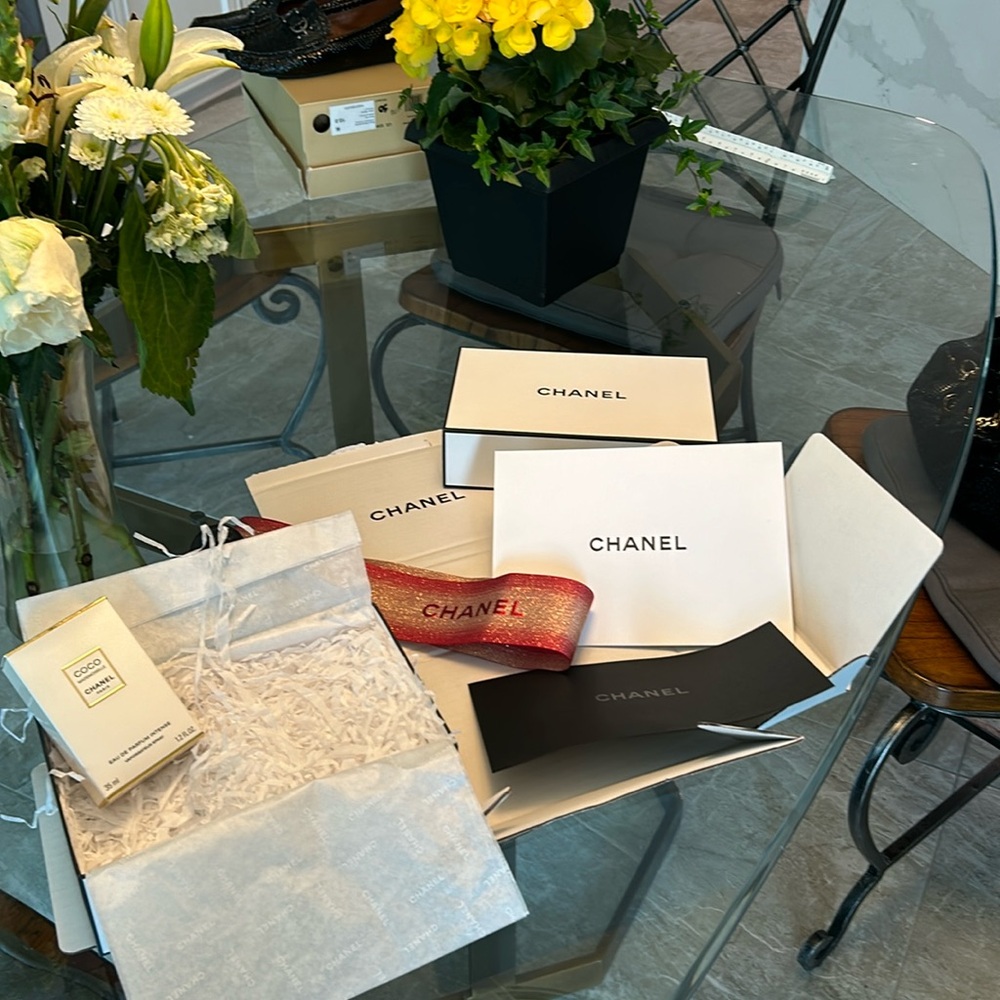 Chanel gift box with banner with EAU DE PARFUM empty  box inside. See details.